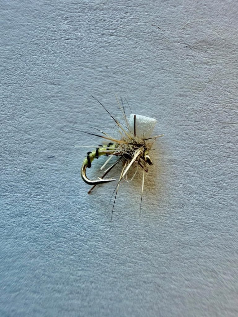 Natural Massacre Midge trout fly, size 20